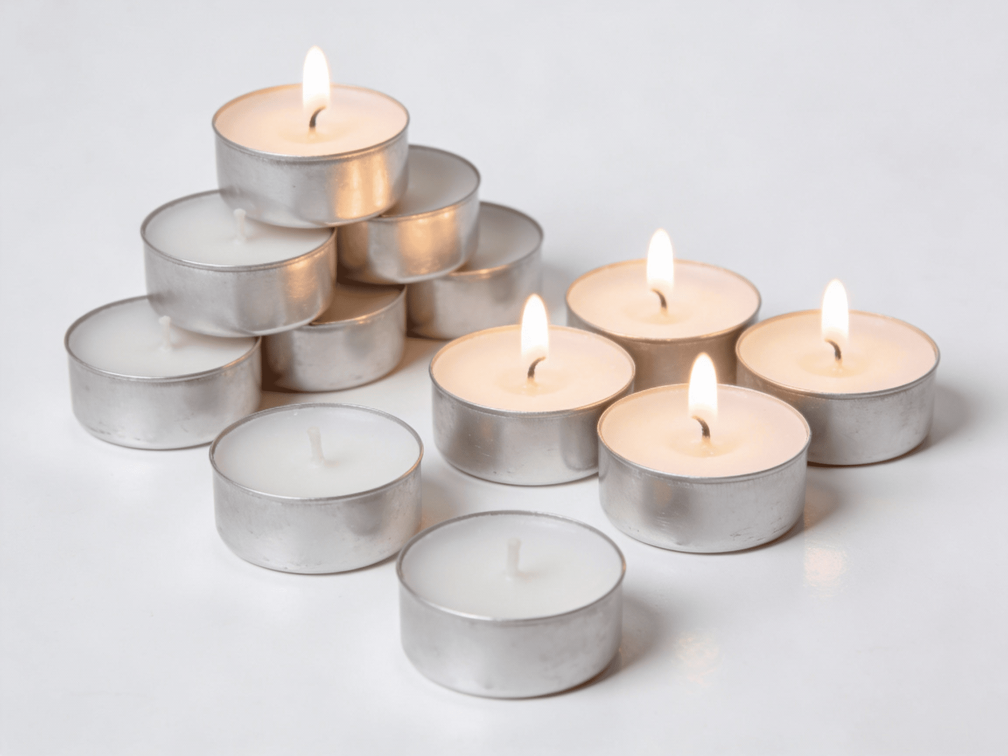 Unscented Tealight Candles Pack of 50 | Smokeless, Long - Lasting Wax – Candles & Fragrances on Brown Living™. SKU: TPCK50. Img 1.