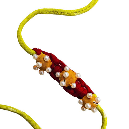 Upcycled Handmade Pearl Gold Rakhi – Rakhi by USE ME WORKS available on Brown Living™. . SKU: UMW - Rakhi - 11. Img 2.