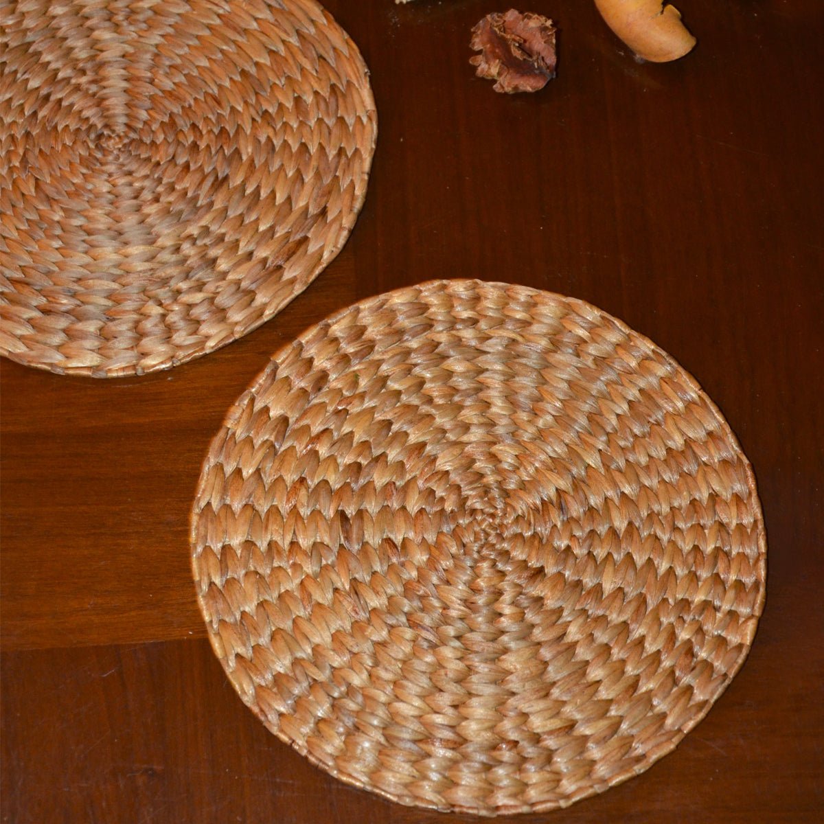Water Hyacinth Round Natural Placemats - Set of 2 – Table Linens on Brown Living™. SKU: WHRMAT023A. Img 1.