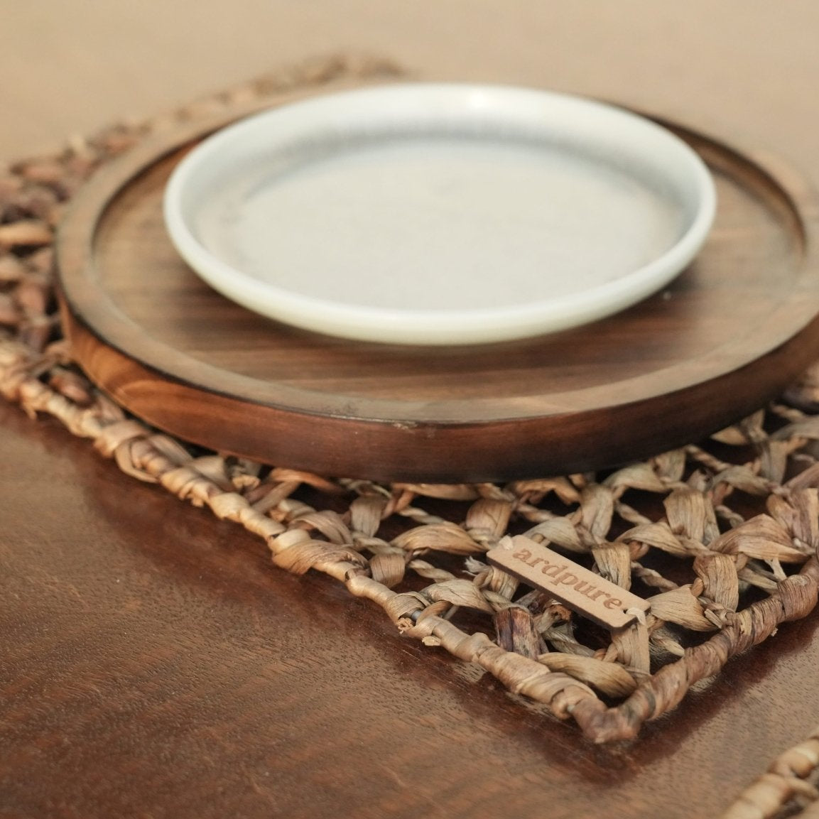WH Flora Placemat | Handwoven Natural Dining Table Mat (Set of 2) – Baskets & Boxes on Brown Living™. SKU: 811WM. Img 1.
