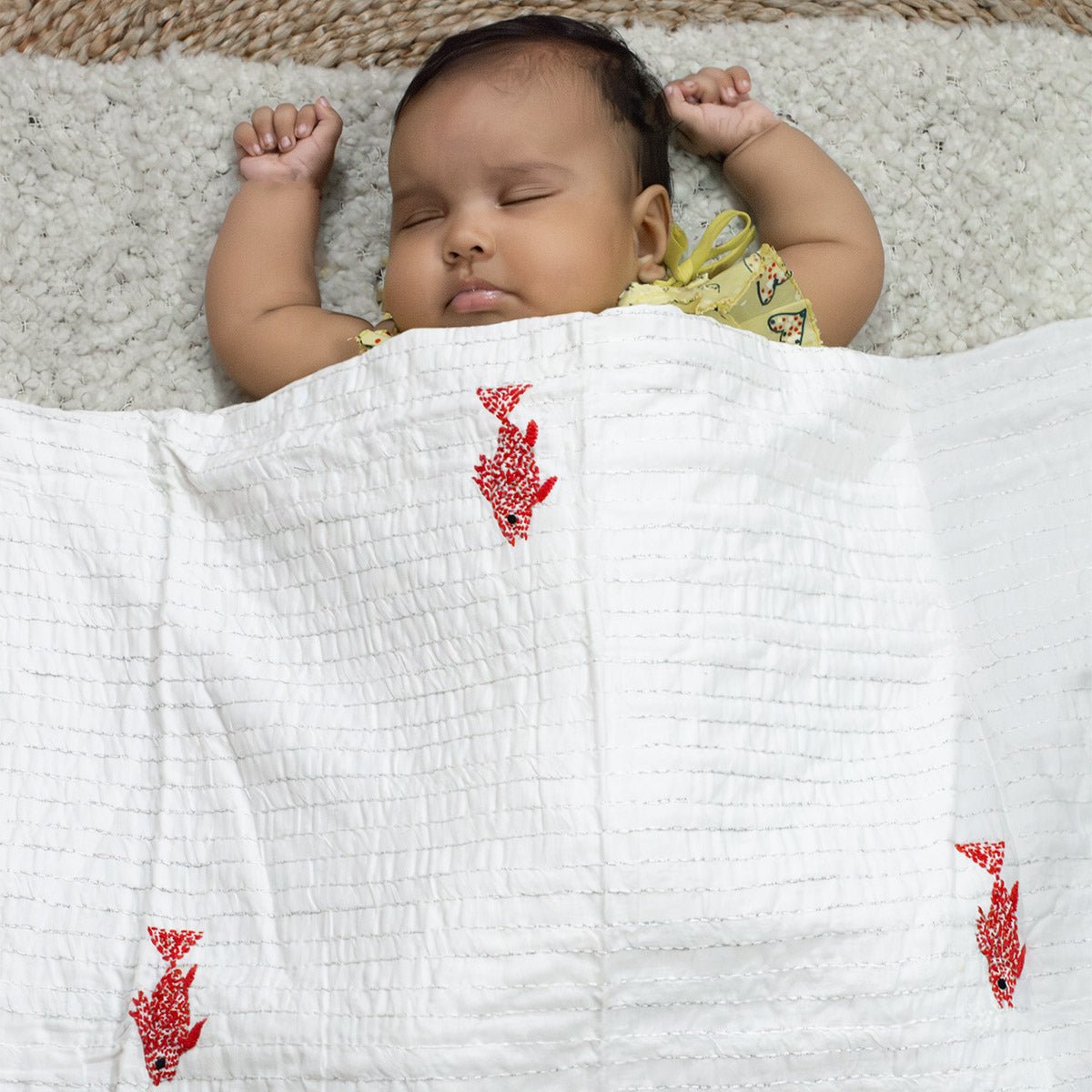 White Mulmul Fish Design Hand Embroidered Baby Nakshi Kantha – Baby Swaddle on Brown Living™. SKU: STRNAKFIS09-YELLOW. Img 20.