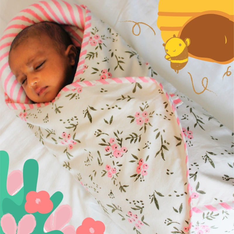 Wildflowers Pink- Knitted Cotton Baby Wrap | Verified Sustainable Baby Swaddle on Brown Living™