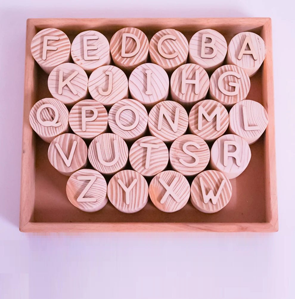 Wooden Double - Sided Letter - Alphabet Stamps – Learning & Educational Toys on Brown Living™. SKU: alphabetstamp. Img 1.