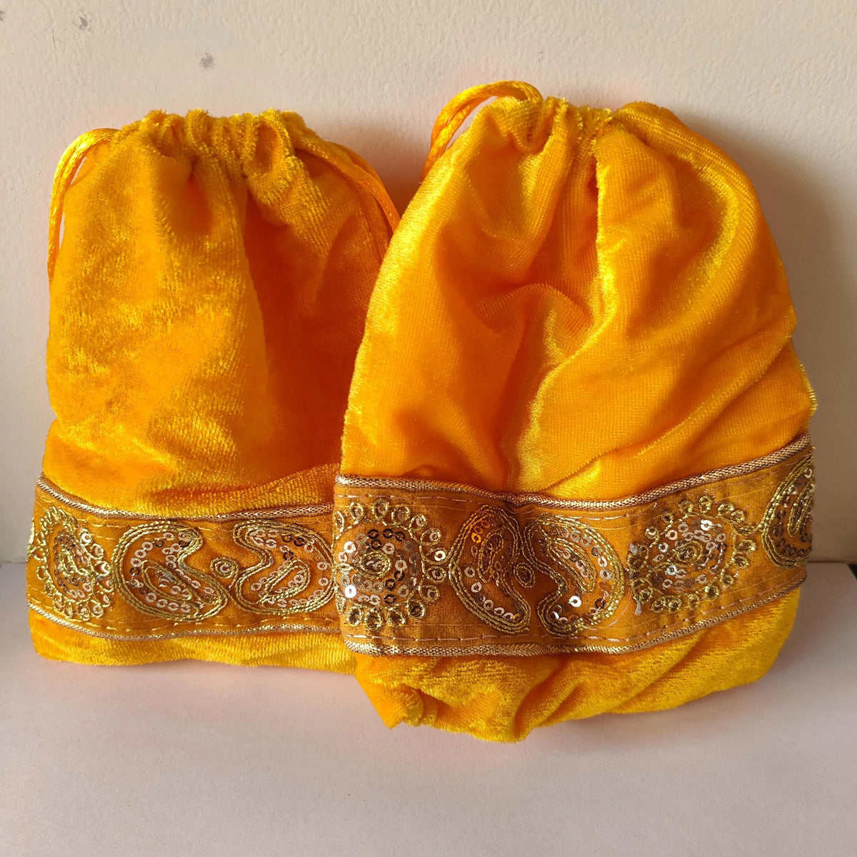 Yellow Traditional Fabric Potli Bags Set of 2 | Festive Gift Bags – Home Decor on Brown Living™. SKU: PB02. Img 4.