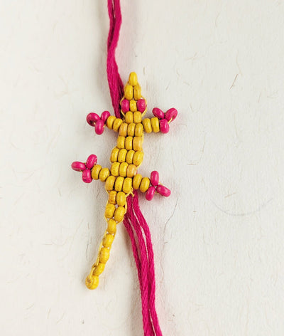 Yellow & White Chhipkali Rakhi Set of 2 – Rakhi on Brown Living™. SKU: GUL-19. Img 4.
