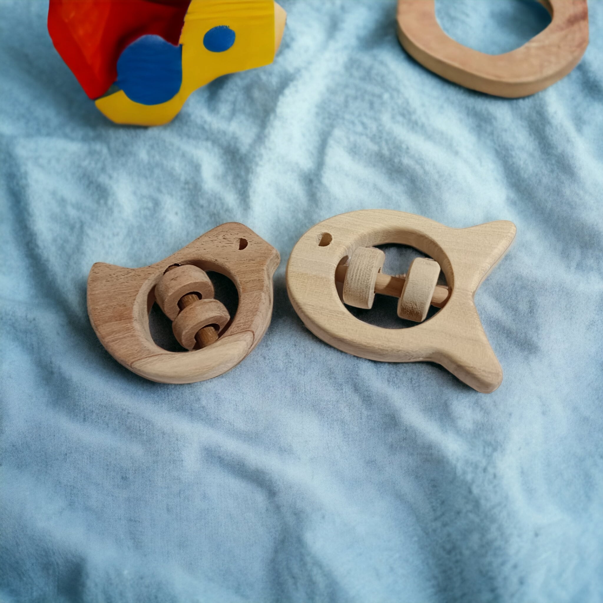 Zero - Chemical Natural Neem Wooden Rattles – Dove & Fish Shapes – Baby Rattles on Brown Living™. SKU: R_DV-FSH. Img 1.