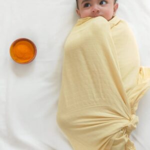 Buy 100% Organic Cotton Swaddle Wrap | Herbally Dyed | Yellow 100 cm x 100 cm | Shop Verified Sustainable Baby Swaddle on Brown Living™