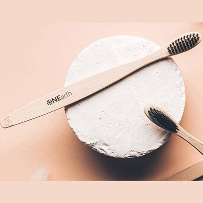 Bamboo Toothbrush - Pack of 4 Charcoal – Tooth Brush on Brown Living™. SKU: OEP025. Img 2.