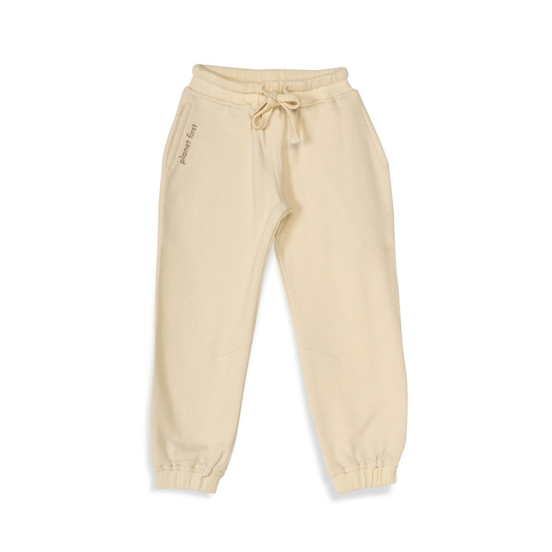 Buy Cream Unisex Joggers in Cotton Fleece | Planet First | Shop Verified Sustainable Kids Pajamas on Brown Living™