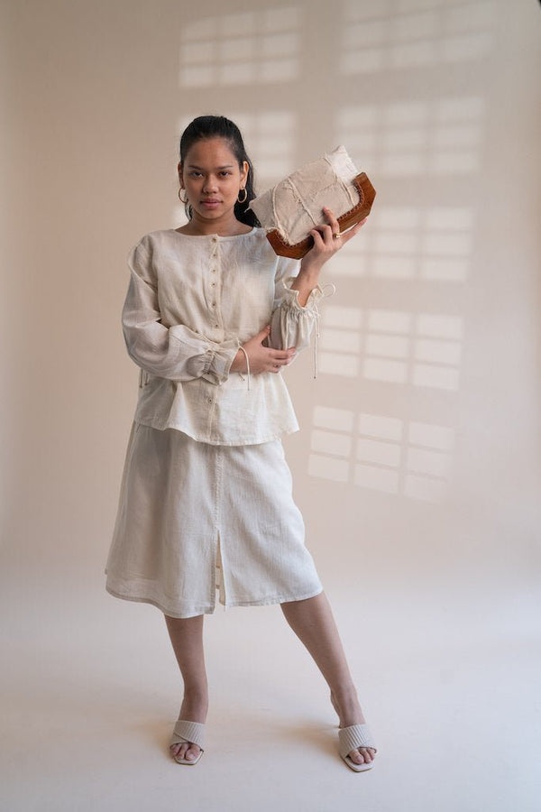 Buy Dawning Peplum Blouse & Flared Skirt Set | Shop Verified Sustainable Products on Brown Living