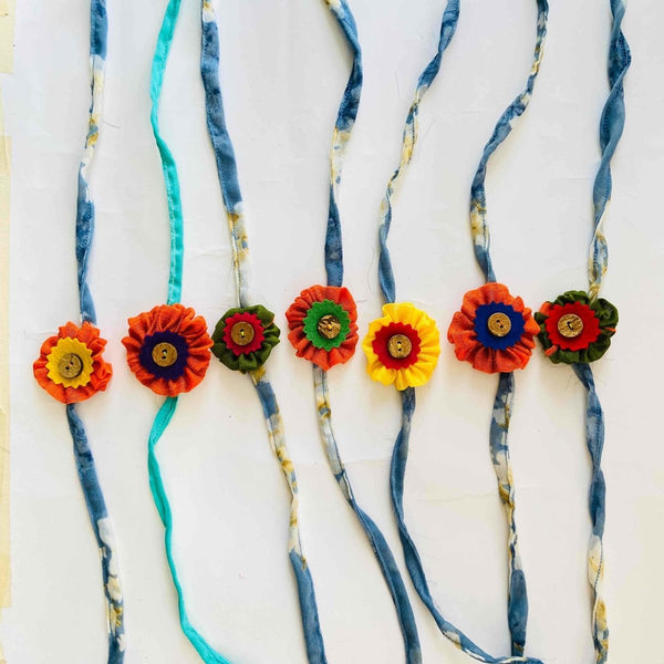 Buy Earth Friendly Rakhis- Orange and Green with Coconut Buttons | Shop Verified Sustainable Rakhi on Brown Living™