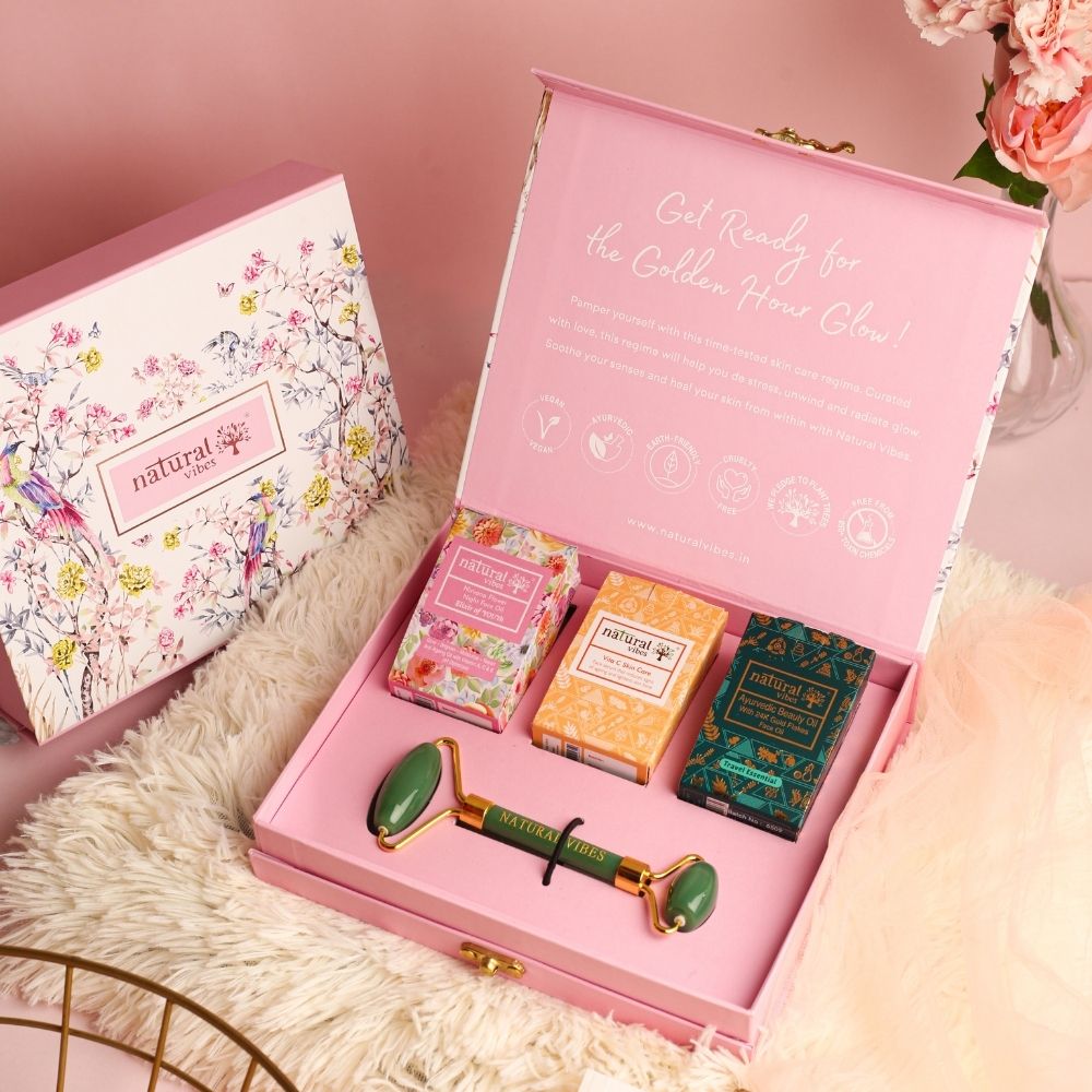 Glow Getter Gift Set with Jade Face Roller – Massager by Natural Vibes available on Brown Living™. . SKU: 063 - 08508 - NV_gift_jade_roller_oils. Img 1.