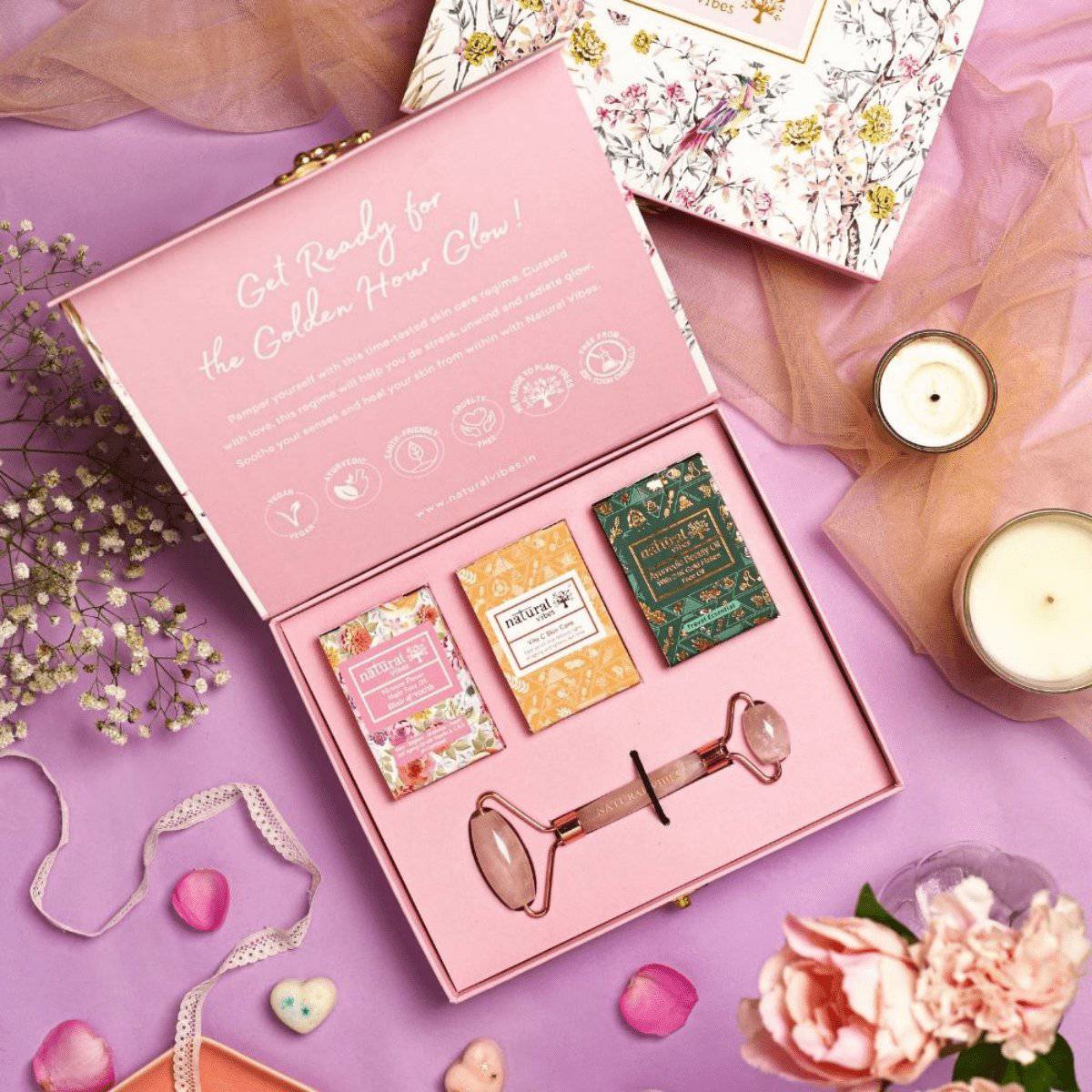 Glow Getter Gift Set with Rose Quartz Face Roller – Massager by Natural Vibes available on Brown Living™. . SKU: 063 - 08506 - NV_gift_rose_roller_oils. Img 1.