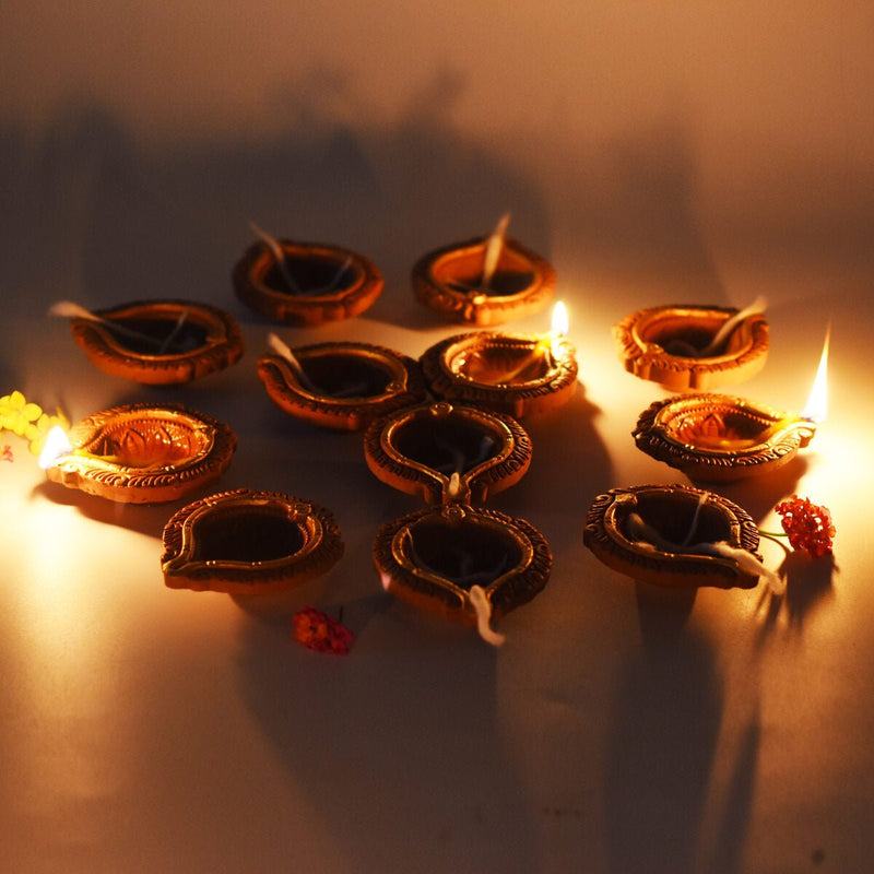 Buy Golden Ring Motiff Diya (Bankura1)- Diwali Special - Set of 12 Diyas & Cotton Wicks | Shop Verified Sustainable Products on Brown Living