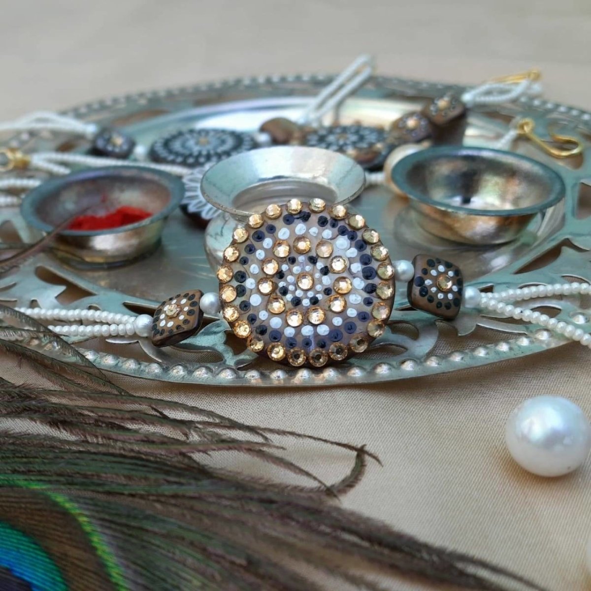 Hand painted pearl shell rakhi | Verified Sustainable by Brown Living™