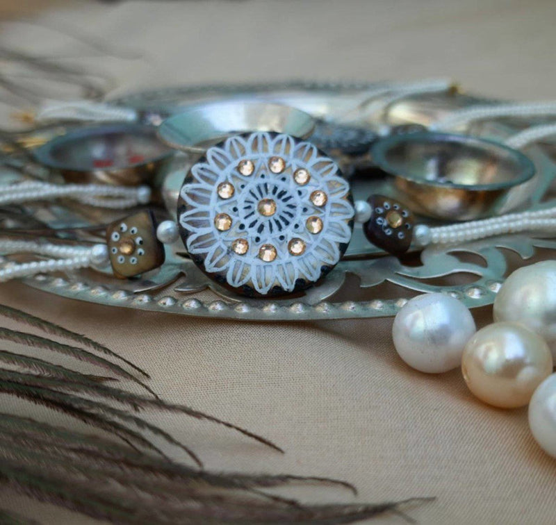Buy Hand Painted Pearl Shell Rakhi | Shop Verified Sustainable Products on Brown Living