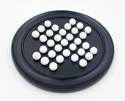 Handmade Wooden Solitaire Board Game with White Glass Marble – Learning & Educational Toys on Brown Living™. SKU: 1007418. Img 5.