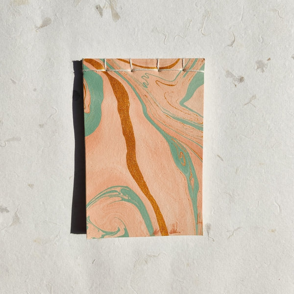 Buy Handmade Paper Notepad | Peach Marble | Shop Verified Sustainable Notebooks & Notepads on Brown Living™