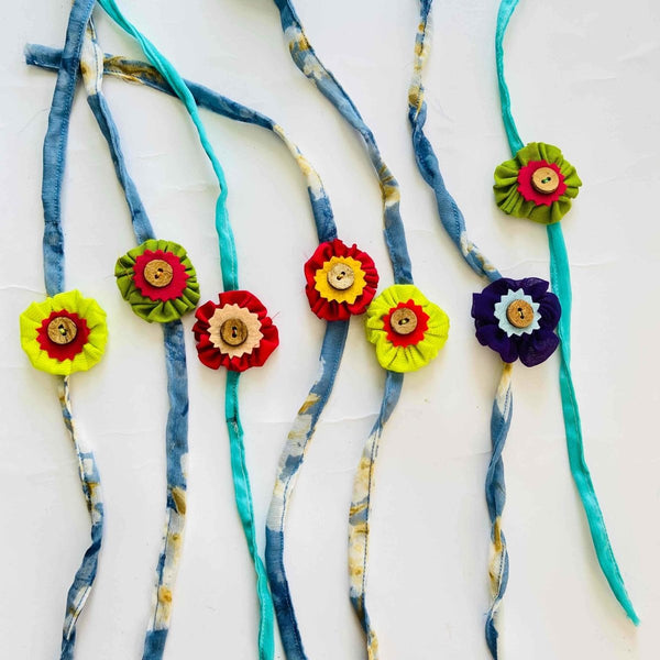 Buy Handmade Rakhi-Green and Red with Coconut buttons | Shop Verified Sustainable Rakhi on Brown Living™