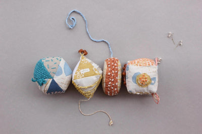 Happy Jingles – Baby Rattles on Brown Living™. SKU: 067 - 01456 - C1TSMIMIE11. Img 1.