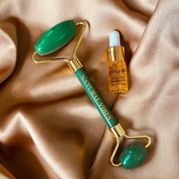 Jade Roller & Massager - Face,Neck&Undereye - FREE Gold Beauty Oil – Massager by Natural Vibes available on Brown Living™. . SKU: 063 - 06400 - NV_Jade_Green_Roller_oil. Img 2.