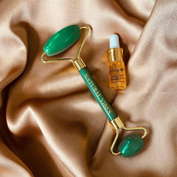 Buy Jade Roller & Massager with FREE Gold Beauty Elixir Oil | Shop Verified Sustainable Massager on Brown Living™
