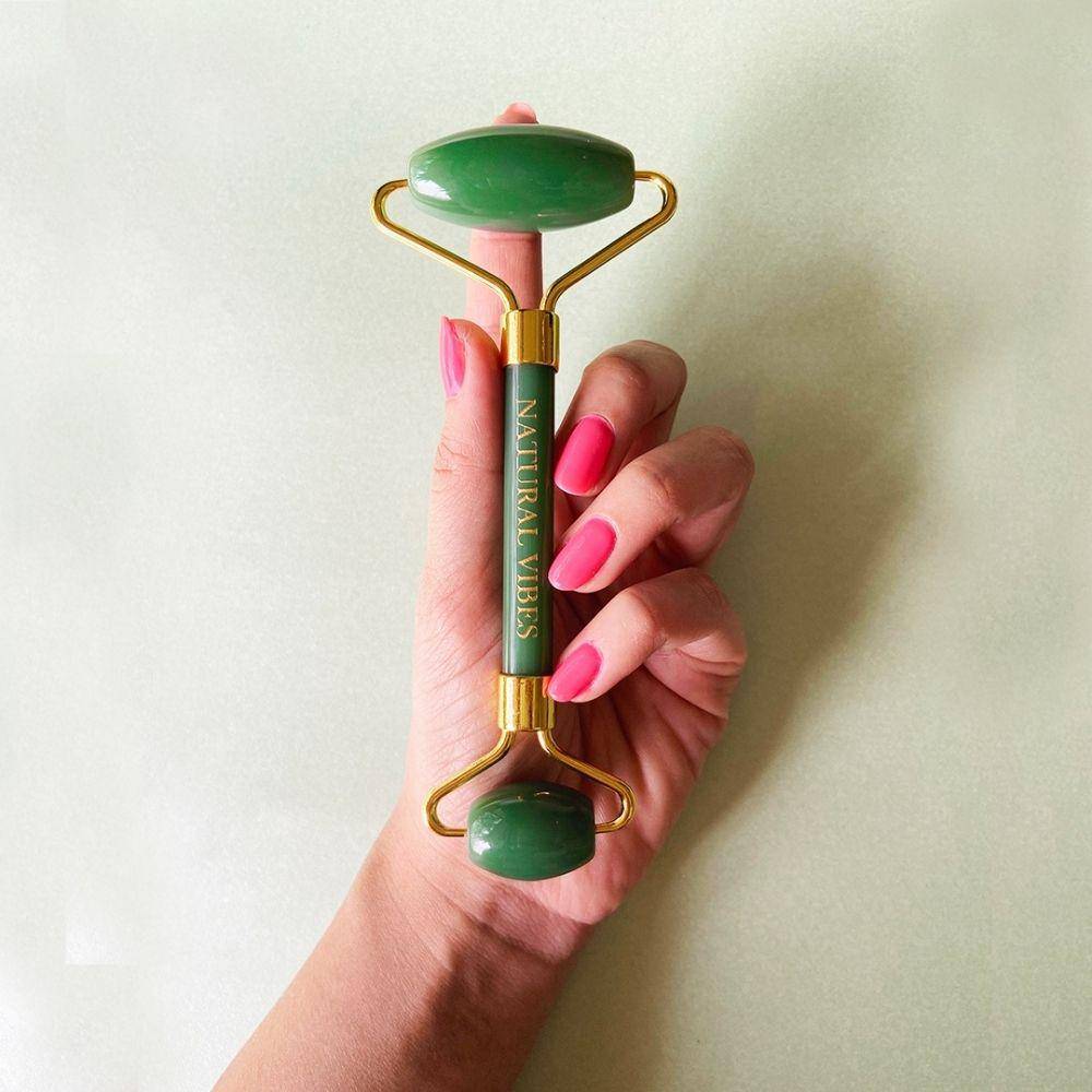 Jade Roller & Massager with FREE Gold Beauty Elixir Oil – Massager by Natural Vibes available on Brown Living™. . SKU: 063 - 05469 - NV_Jade_Green_Roller_oil. Img 2.