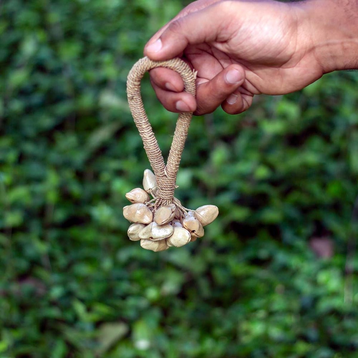 Kenari Seed Rattle with Rattan Handle - Small | Verified Sustainable by Brown Living™