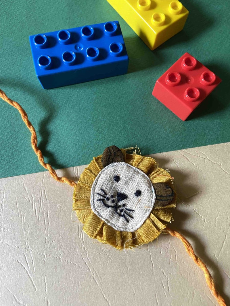 Buy Lion Face Patchwork Rakhi - Kids | Shop Verified Sustainable Products on Brown Living