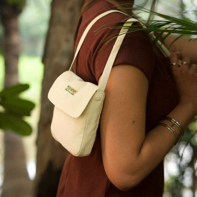 Mineral Dyed Mini Cross Body Coin Purse- Elumi/Lemon | Verified Sustainable Womens Wallet on Brown Living™