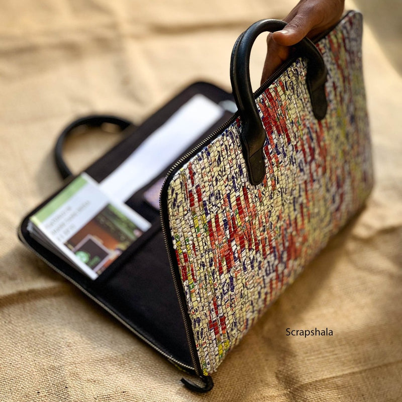 Buy Minimalist Laptop Sleeve Bag | Upcycled Plastic | Handloom Textile | Water-Resistant | Tube Handle | Shop Verified Sustainable Products on Brown Living