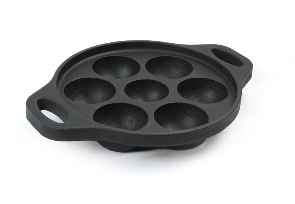https://brownliving.in/cdn/shop/products/pre-seasoned-cast-iron-appe-paniyaram-paddu-pan-7-pit-verified-sustainable-products-on-brown-living-286086_1024x.jpg?v=1695475410