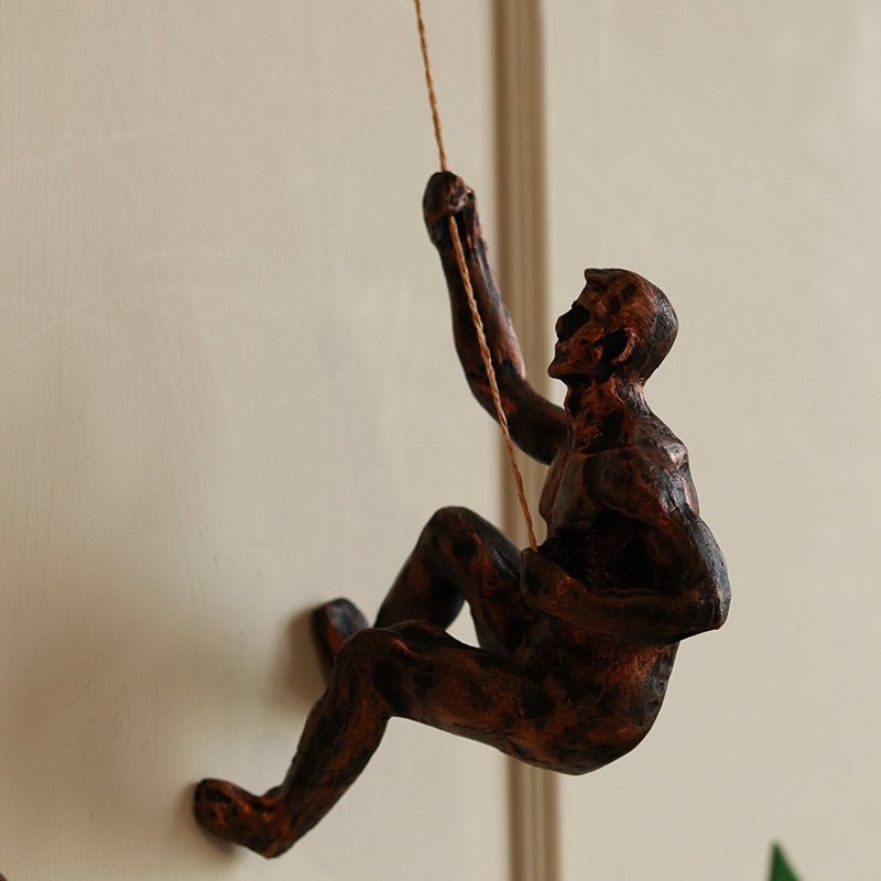Buy Resin Hanging Man Figurines-Golden | Shop Verified Sustainable Products on Brown Living