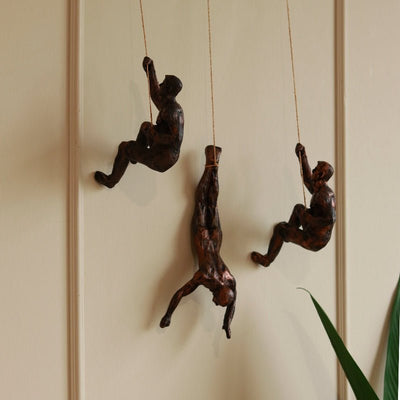 Resin Hanging Man Figurines - Golden – Wall Decor on Brown Living™. SKU: 347514. Img 4.