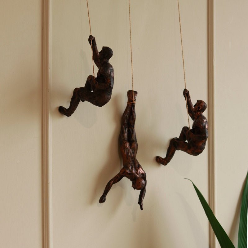 Resin Hanging Man Figurines - Golden – Wall Decor on Brown Living™. SKU: 347514. Img 4.
