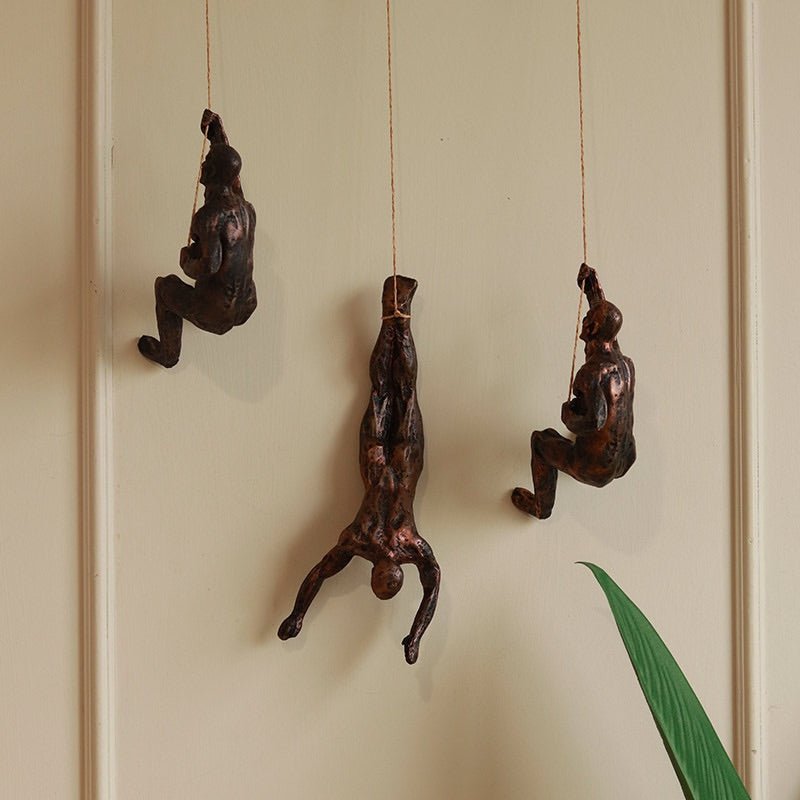 Buy Resin Hanging Man Figurines-Golden | Shop Verified Sustainable Products on Brown Living