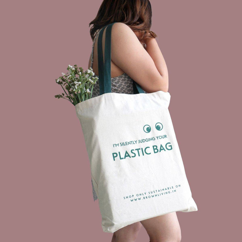 Buy Reusable Cotton Tote Bag- Silently Judging your Plastic Bag- Off White | Shop Verified Sustainable Tote Bag on Brown Living™