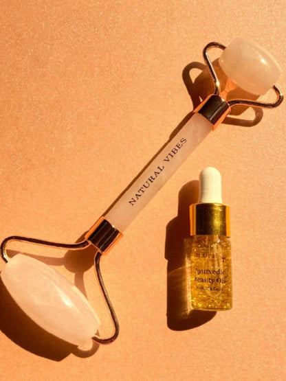 Rose Quartz Roller & Massager for Face, Neck and Under eye with FREE Gold Beauty Oil – Massager by Natural Vibes available on Brown Living™. . SKU: 063 - 05428 - NV_Rose_Quartz_Roller_oil. Img 10.