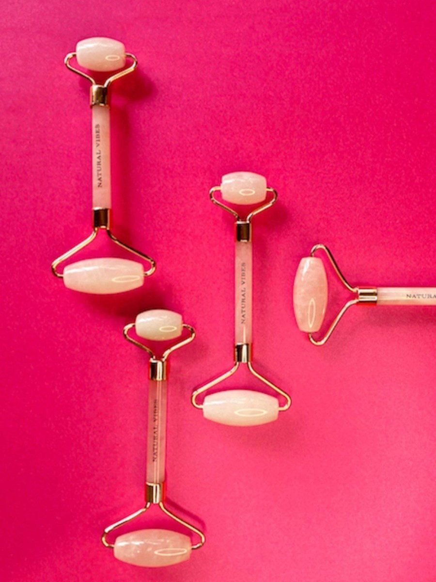 Rose Quartz Roller & Massager for Face, Neck and Under eye with FREE Gold Beauty Oil – Massager by Natural Vibes available on Brown Living™. . SKU: 063 - 05428 - NV_Rose_Quartz_Roller_oil. Img 4.