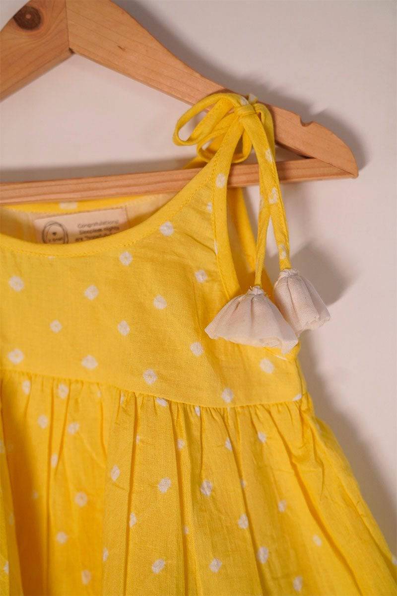 Buy Song In Your Heart' Yellow Bandhani Infant Baby Cotton Sleeveless Tiered Dress | Shop Verified Sustainable Products on Brown Living