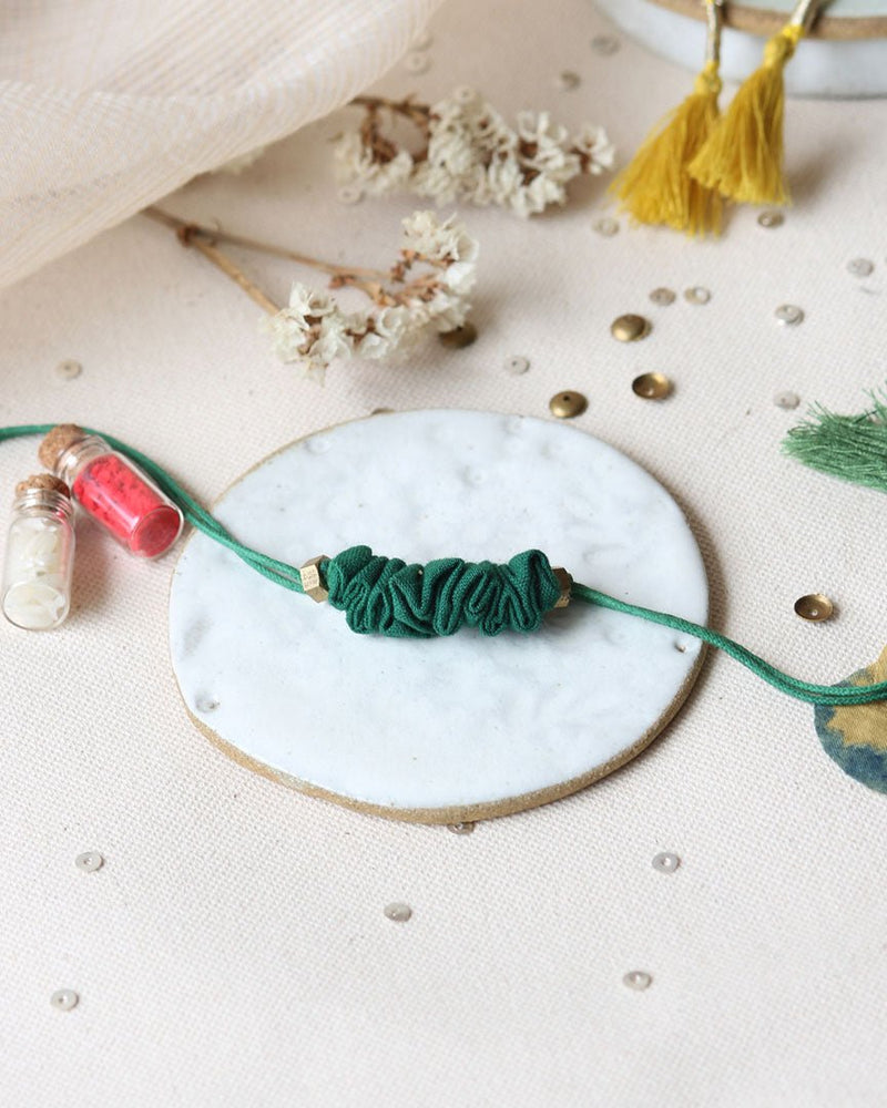 Buy Upcycled Artisanal Rakhi- Traditional Dark Green | Shop Verified Sustainable Products on Brown Living