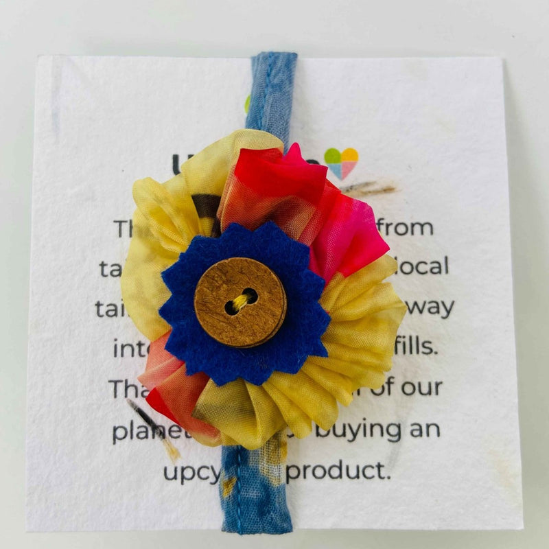 Buy Upcycled Rakhi- Yellow with colours and Coconut button | Shop Verified Sustainable Products on Brown Living