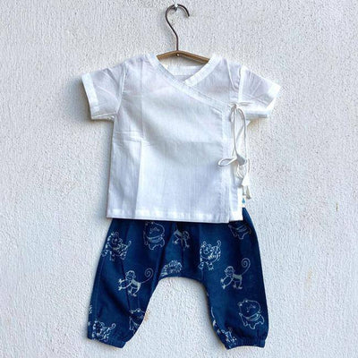 White Angrakha Top with Zoo Print Indigo Pants – Kids Daywear Sets on Brown Living™. SKU: 186 - 06130 - PLN - WHT - ANG+ZOO - ING - PYJ1. Img 1.