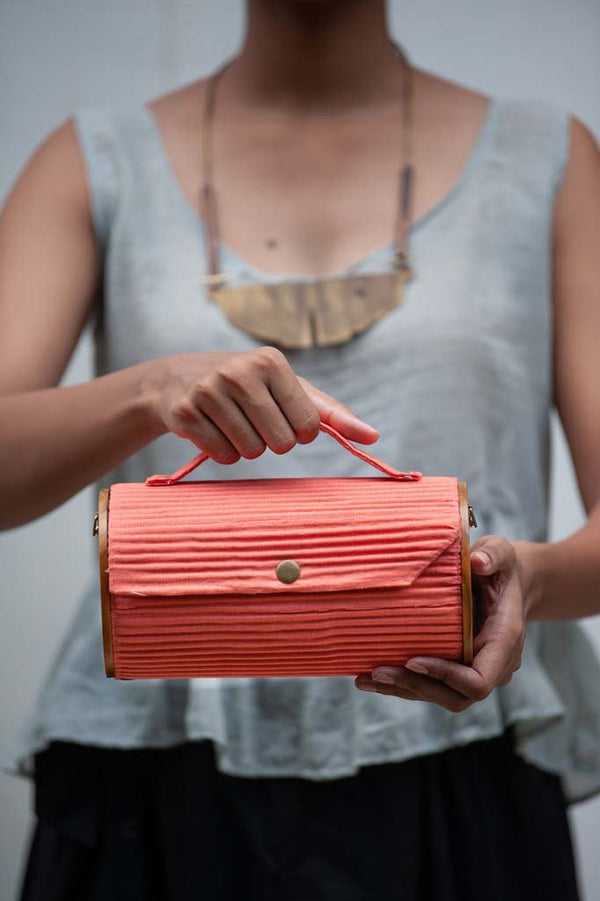 Buy Wild Peach Round Clutch | Shop Verified Sustainable Womens Bag on Brown Living™